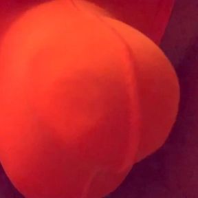 Playing in a orange thong