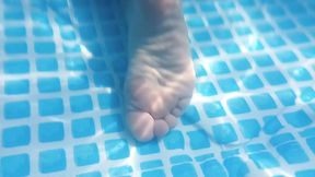 Underwater footsie