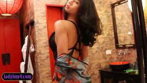 Big fake boobs ladyboy in lingerie gives a blowjob