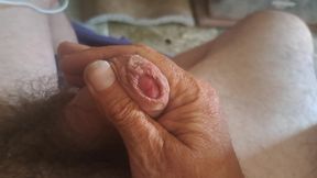 An obese old man having a nice wank