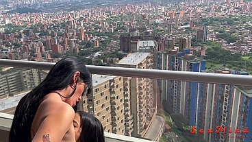 Yenifer Chacon and a delicious Venezuelan brunette girl with big tits having hardcore sex with their coach on a balcony