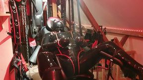 Rubber Drone Restrained And Fucked