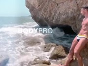Spanish stud teasing on the beach