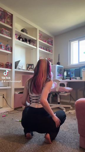 Gamer Girl Squatting in Living Room
