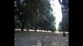 Crossdresser Walking in the almond orchard