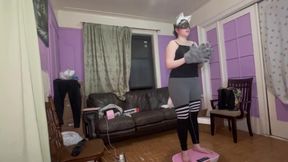Wolf furry girl on a full body vibrating plate