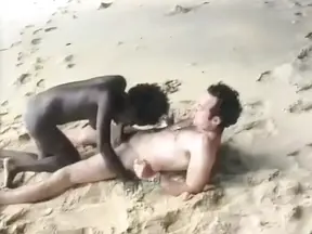 Sexy French ebony gets her tits sprayed on the beach