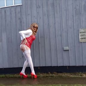 Tranny Outdoors Pissing in Red PVC Dress