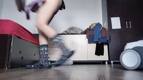 Amateur mom cleans naked with vacuum cleaner in the house.