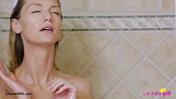 Captivating fair-haired model took a shower