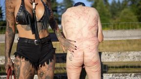 Outdoor intense whipping at the ranch