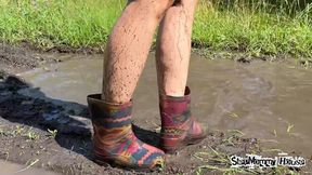 Color Wellies Stuck in Mud & Messy after Rain - Boots Full of Mud, Walking Outdoors off Road, Dirty Soles rubber Boots, Wet & Messy, Discarded shoes, Powerful Woman, Wrecked Shoes