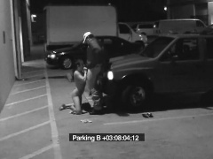 Slut gets naked and sucks off a guy on parking deck security cam