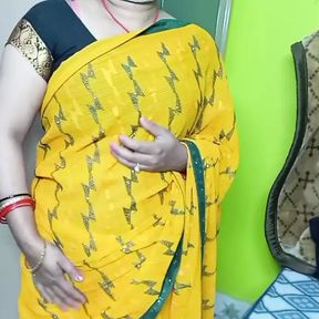 Beautiful bhabhi wearing yellow sari.