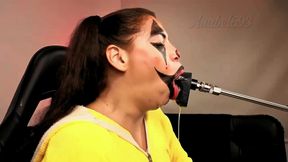Naughty Clown Fucks Her Throat with a Fuck Machine