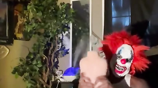 Scary clown tearing up pocket snatch