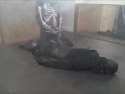 skeleton wearing a wetsuit