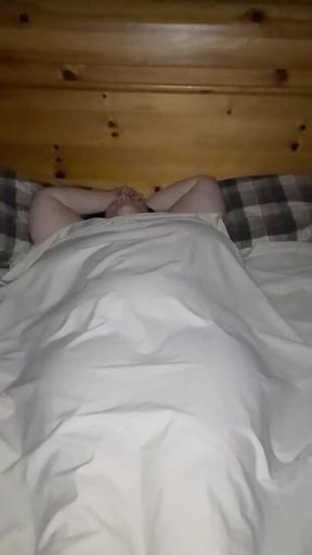 Curvy solo girl lies back for a hot moment