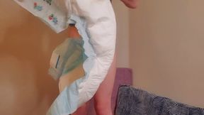 Girl in Lingeire Wets SDK Diaper