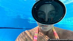 Carissa in the orange bikini in the resort pool part 1