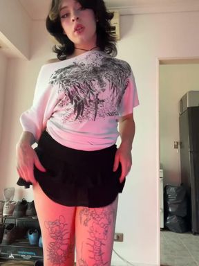 Solo trans brunette shows off her big tits