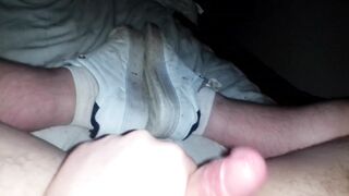 Naive stud jerks off to sneaker socks while cumming in Homo Hunk's shoes