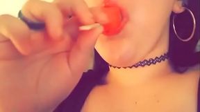 Sucking on a popsicle