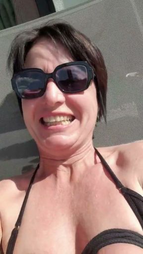 Julie sunbathes naked and has orgaamus   Clip 1