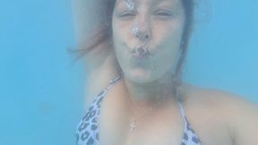 Lets swim, sit on step and blow bubbles underwater