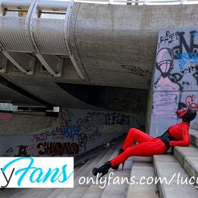 video from photoshoot - red latex catsuit with gas mask