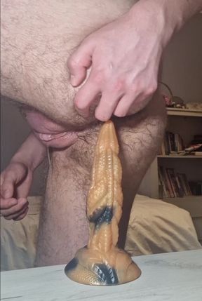 Hairy ass gets an anal pounding with a dildo