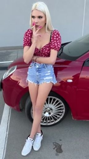 A nice blondie teen is smoking and spitting