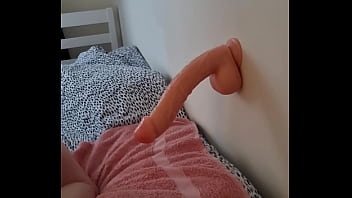 Sissy takes huge dildo doggy style