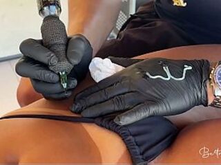 The golden-haired paid for the tattoo with her twat 'cuz it was smooth.