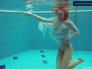 Redhead Diana hot and horny in a white dress