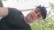 Smoking outdoor and showing balls and soft uncut cock