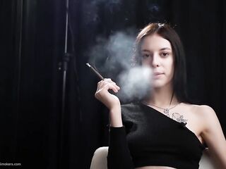 Skinny Playgirl Is Smokin' One Red