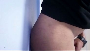 Hot Latino guy playing with huge dildo on wall