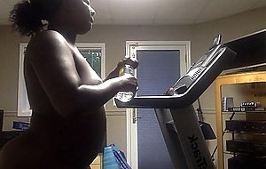 Black amateur naked on the treadmill