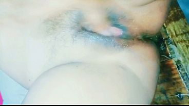 Indian bhabhi's hairy and juicy pussy gets fingered for intense orgasm.