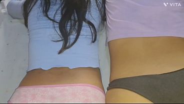 Two delicious little butts get very wet