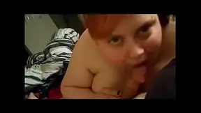 Amateur BBW with a tattoo and bubble piercings gives a deepthroat BJ