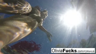 Olivia Austin has some summer fun in the pool