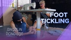 She gets tickled by a man who tied her to the sewing machine with tape (1)