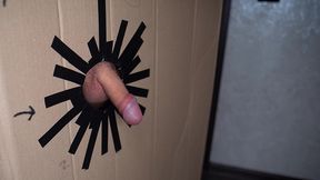 a hole in the wall with a cock and a girl sucking a cock to orgasm
