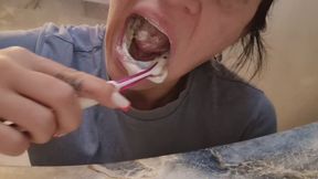 Brush my teeth and tongue, highlighting my mouth.