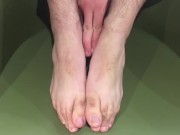 Manlyfoot - The green chair - Aussie guys size 11 1/2 feet on display in work trip hotel room