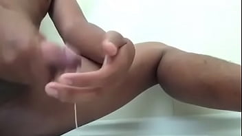 Half Filipino rubbing jizz on cock