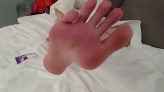 Perfect feet balmed and massaged by a petite chick with long toes and soft soles