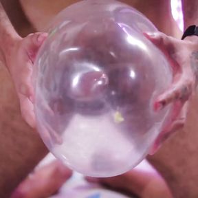 Looner Condom Popping Camilo Brown Popping Inflated Condoms with His Big Uncut Cock and Licks His Own Cum From the Condom